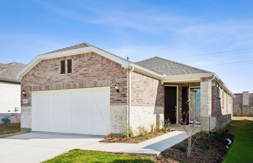 Exterior:The Contour, a one-story home with 2-car garage, shown with Home Exterior LS204