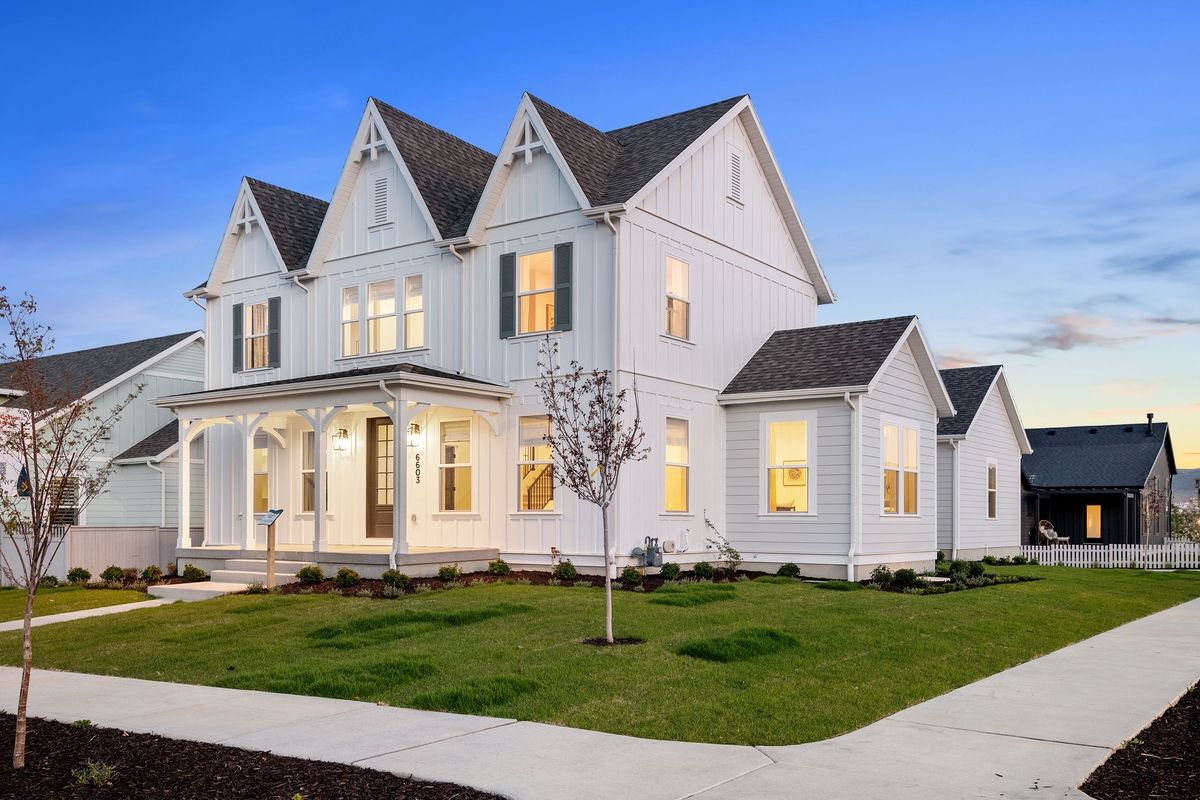 Front exterior of Providence Series home with modern design in Daybreak