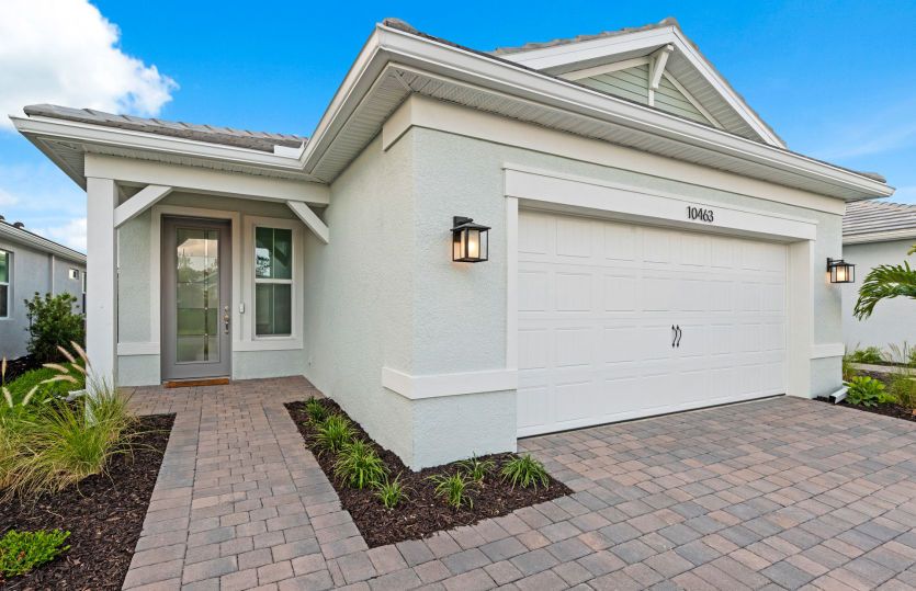 Exterior:Welcoming Hallmark Exterior with Impact Glass