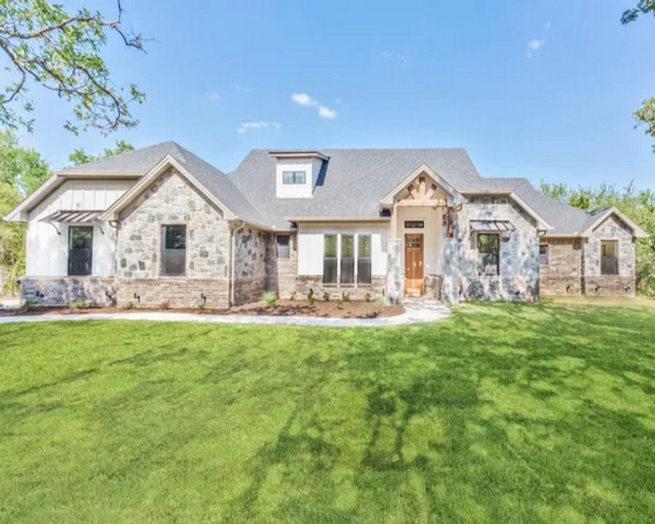 The Harper Plan at Monarch Manor in Poolville, TX by Doug Parr Homes