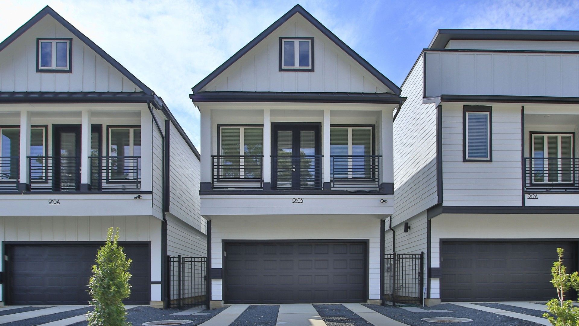 Shady Acres Home - 910B W 21st Street - Modern Design with Balcony:Elegant facade with sleek balcony and modern architecture in Shady Acres, 910B W 21st Street.