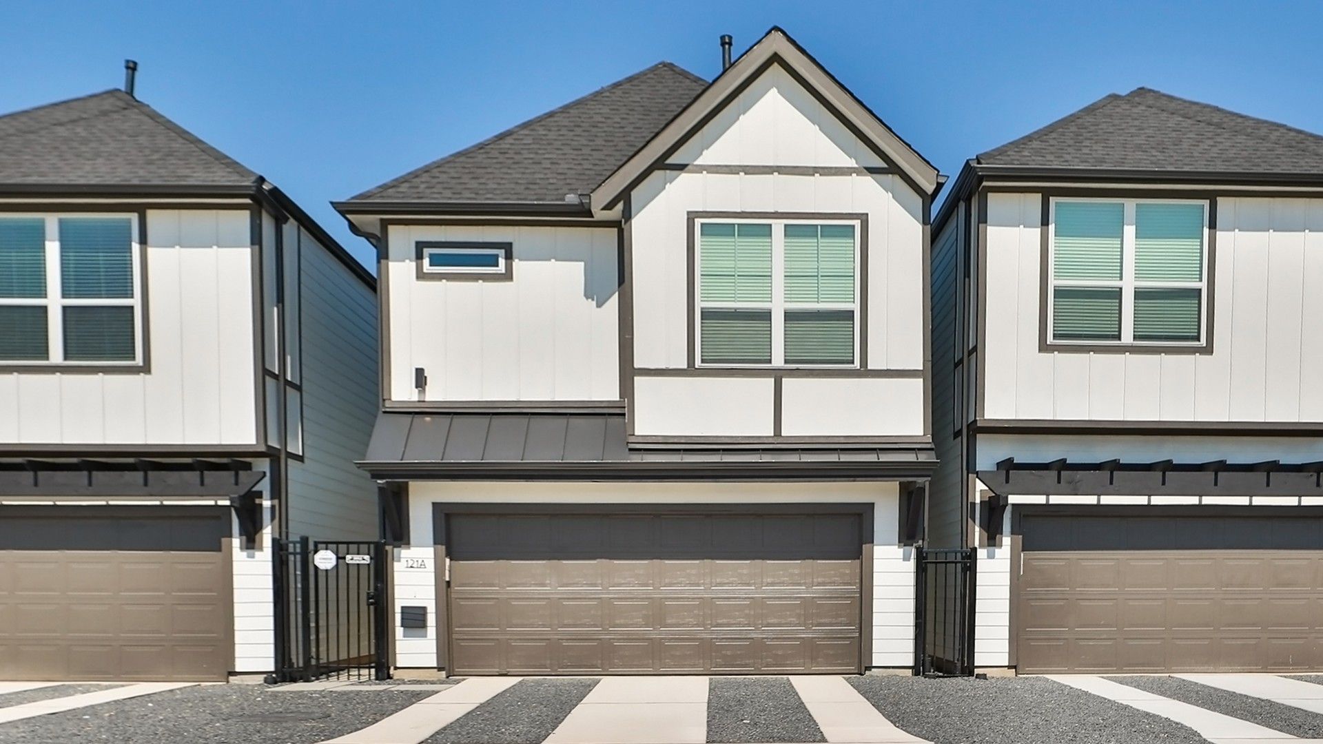 Modern Townhouse in Independence Heights with Gabled Roof:Exquisite gabled roof and sleek facade exemplify modern luxury in Independence Heights.