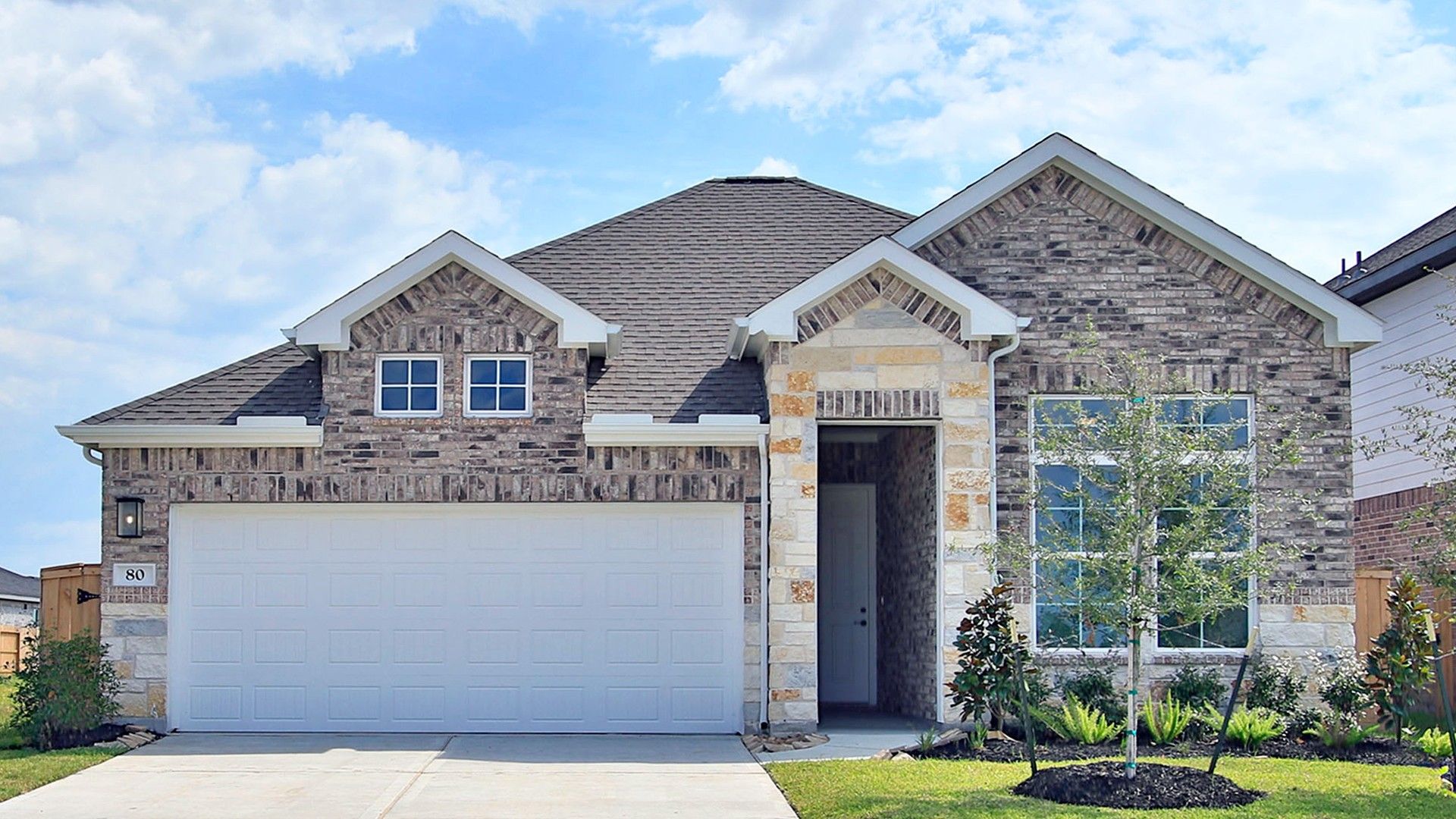Single-Family Home at 80 Thickets Grove Drive, River Ranch:Stunning brick exterior with classic gable roof in River Ranch's Enclave - Aruba floor plan.