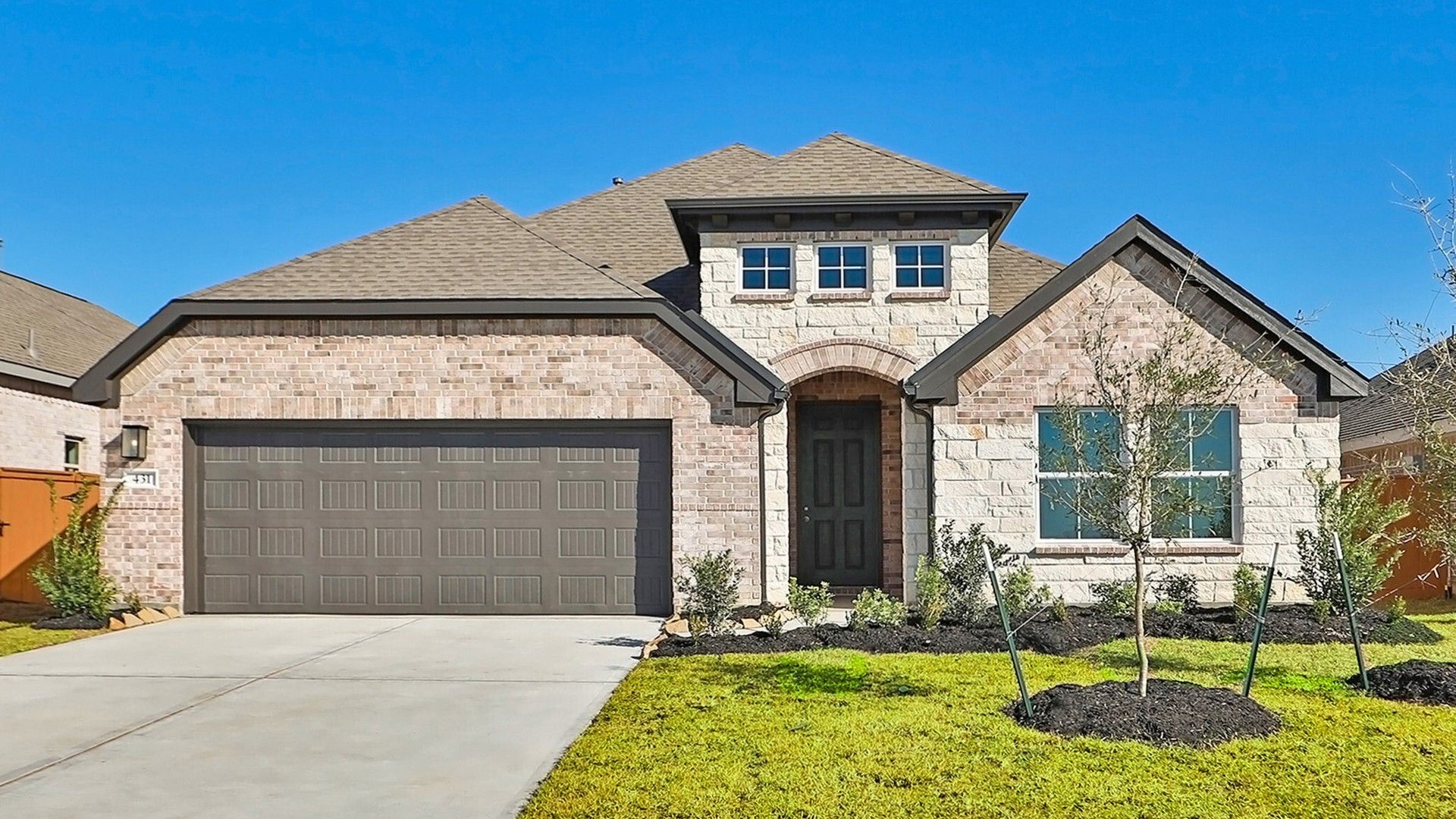 Stunning Brick Home with Gable Roof in River Ranch:Experience luxurious living in this elegant brick facade residence boasting a refined gable roof in River Ranch.