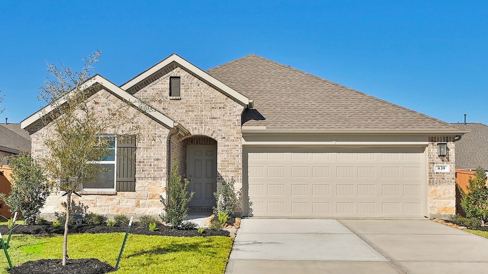 Brick Home with Gable Roof in River Ranch, Bermuda:Exquisite brick façade and elegant gable roof define this River Ranch residence.