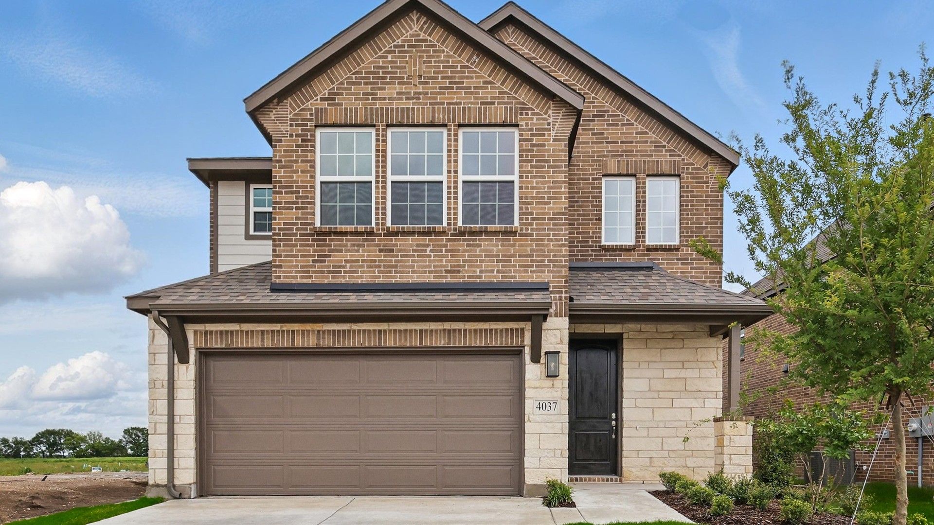 Elevation G:Elegant brick facade and gabled roof define this Bel Air Village home at 4037 Tony Street.