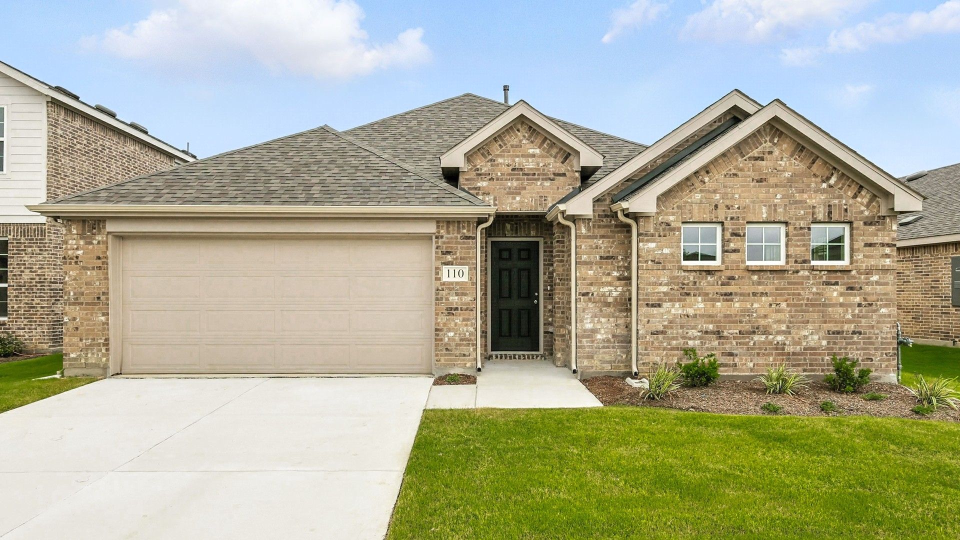 Charming Brick Home in Patriot Estates with Gabled Roof:Exquisite brick facade and elegant gabled roof underscore this Patriot Estates home's refined architecture.