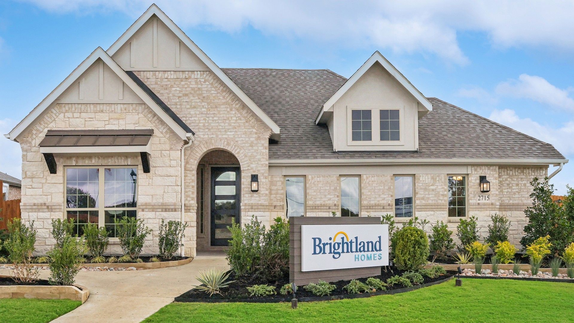 Modern Brick House with Gabled Roof in Churchill Community:Exquisite brick craftsmanship, striking gabled roof, and refined landscaping in Churchill community.
