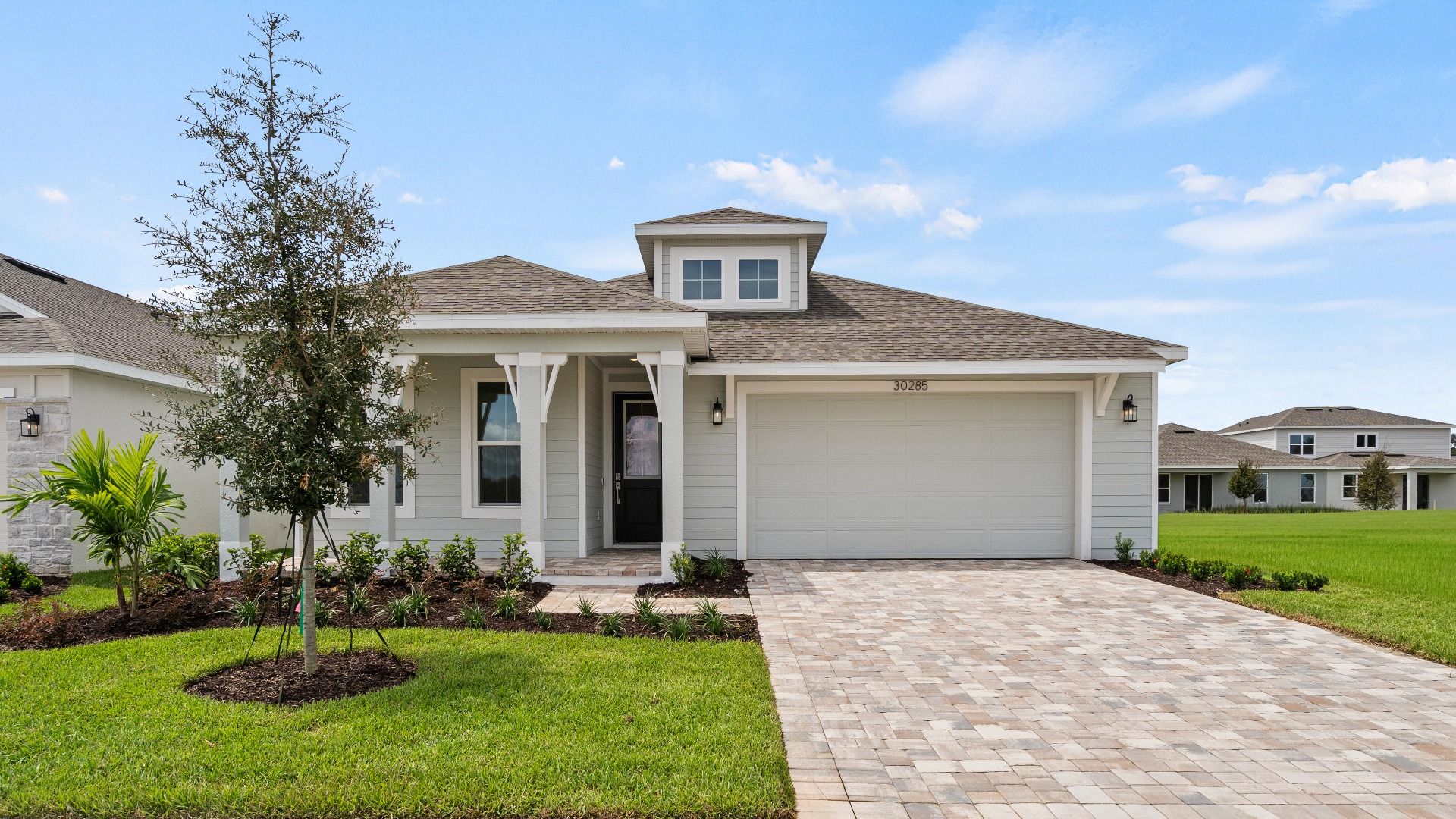 Front Exterior:Front Exterior of the Buttonwood by DRB Homes in Trailside located in Mount Dora, FL.