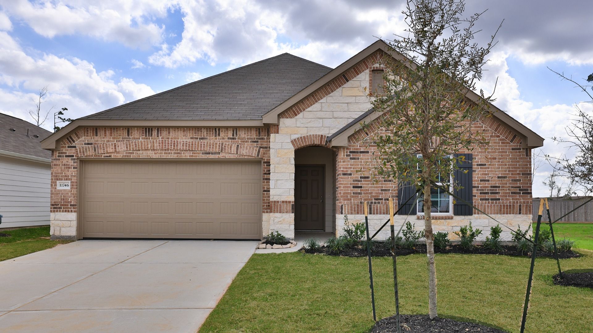 Modern brick single-family home design and architecture.:Elevation P