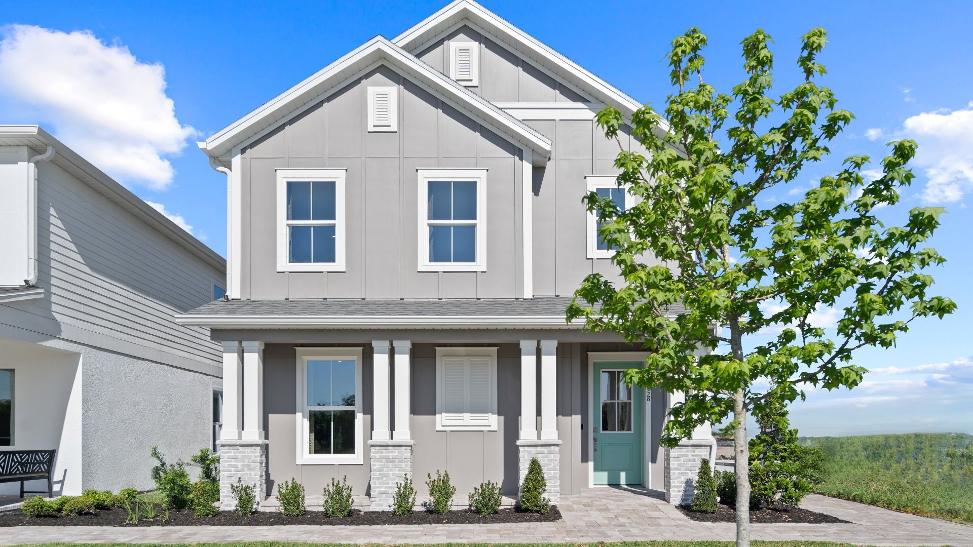 Clementine:Clementine two-story new construction home design at Lakeside at Satilla by DRB Homes in St. Cloud, Florida.