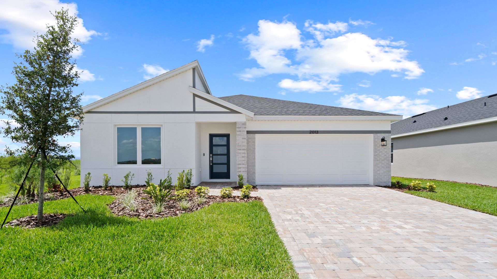 The Atwood by DRB Homes in Hamilton Bluff, Haines City, FL:The Atwood Exterior by DRB Homes in Hamilton Bluff, Haines City, FL