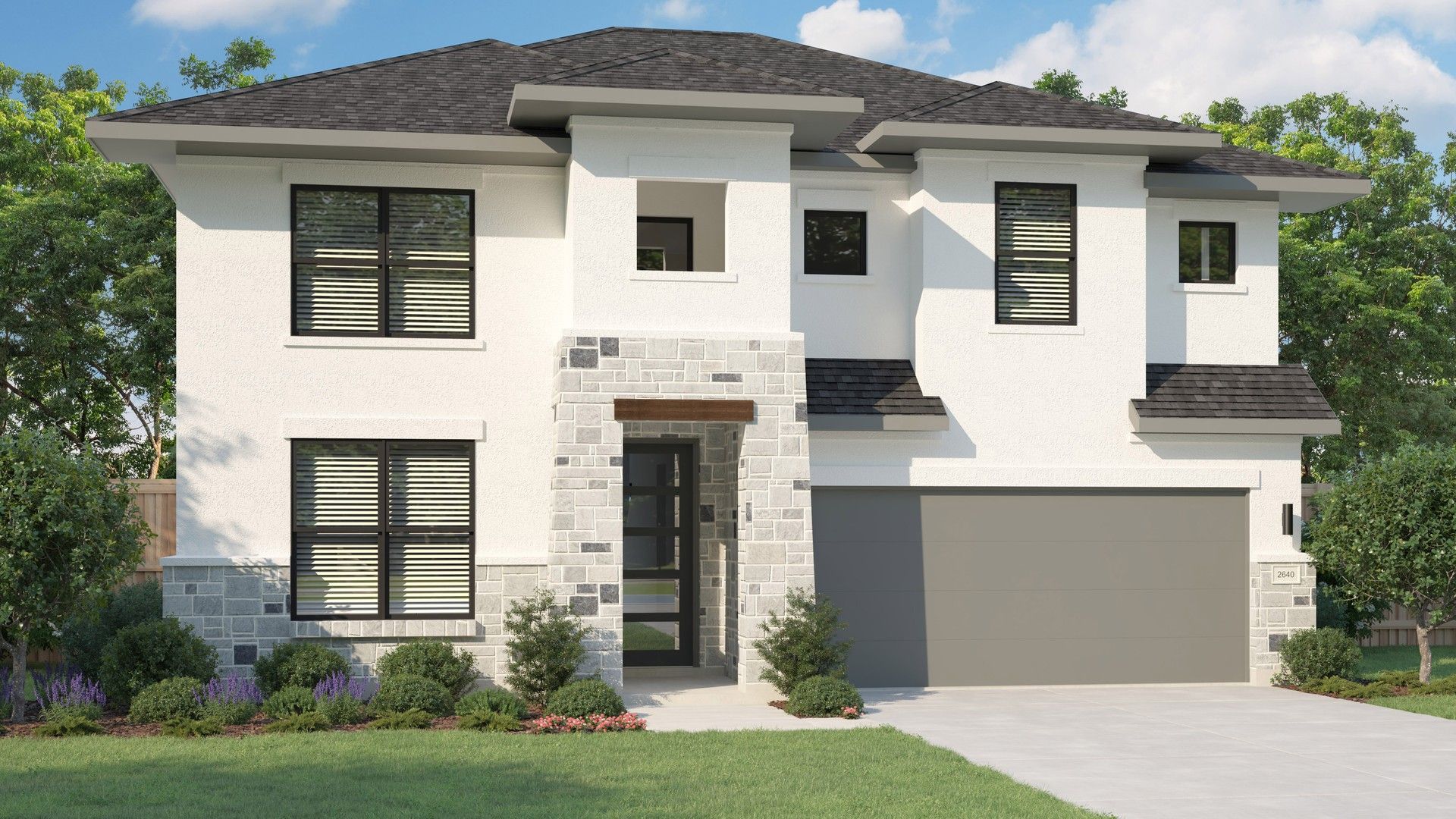 Modern Two-Story Home with Stone Accents in Magnolia Lakeside Meadows:Sleek stonework and expansive windows enhance this modern Magnolia home at Lakeside Meadows.