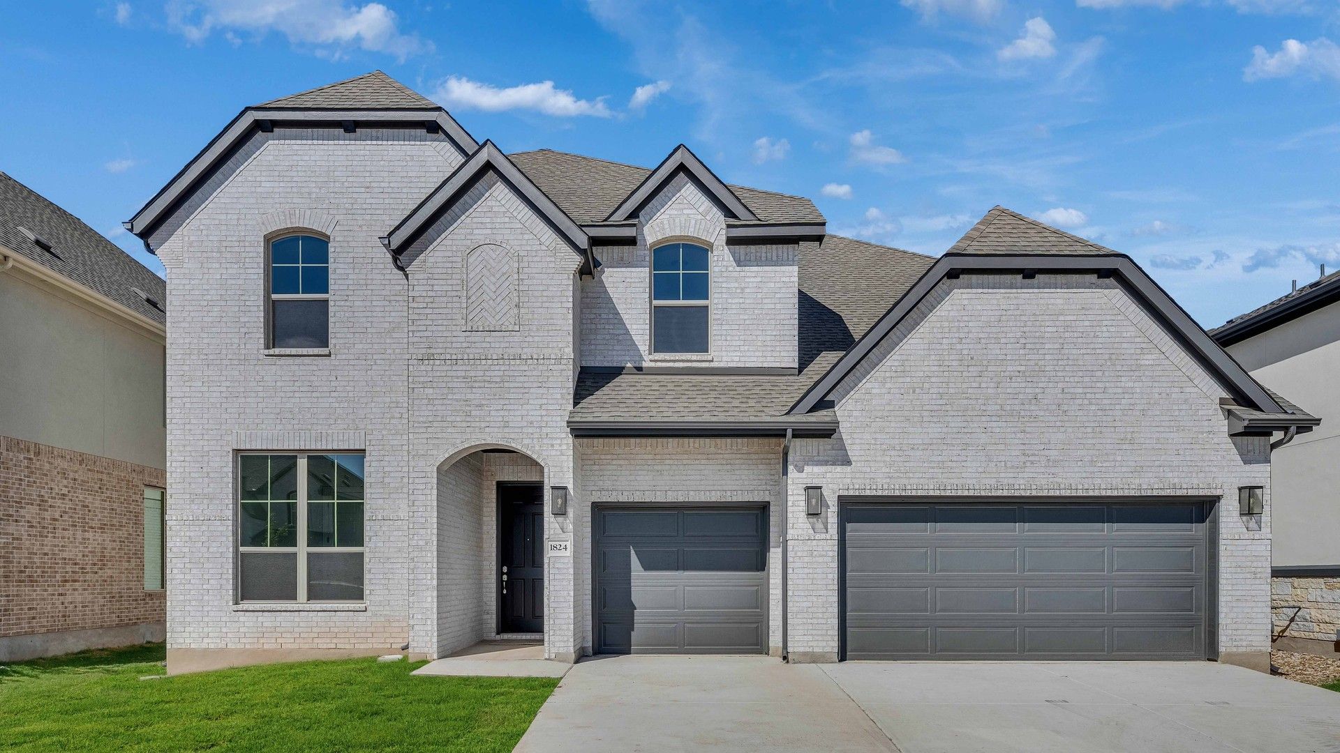 Modern Brick Home with Gabled Roof in Dartmouth at Hawkes Landing:Elegant brick façade with dual garage; classic gabled roof design. Situated in Dartmouth's prestigious Hawkes Landing.