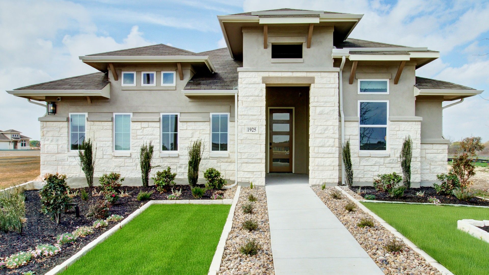 Contemporary Stone-Facade Home in Veranda Community:Elegant stone facade and pristine landscaping detail this Veranda community gem.