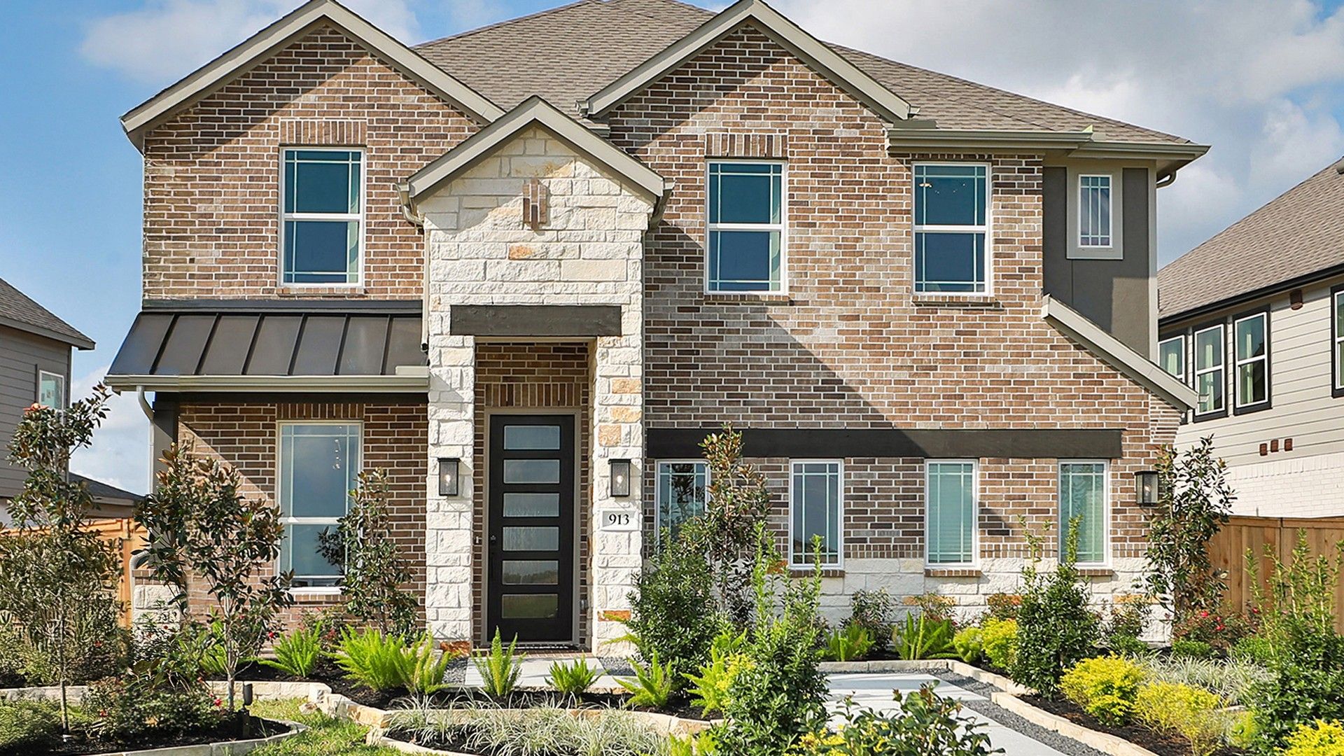 Stunning Brick and Stone Home in Clear Creek Community:Luxurious brick facade with exquisite stone accents and lush landscaping in Clear Creek's prestigious neighborhood.