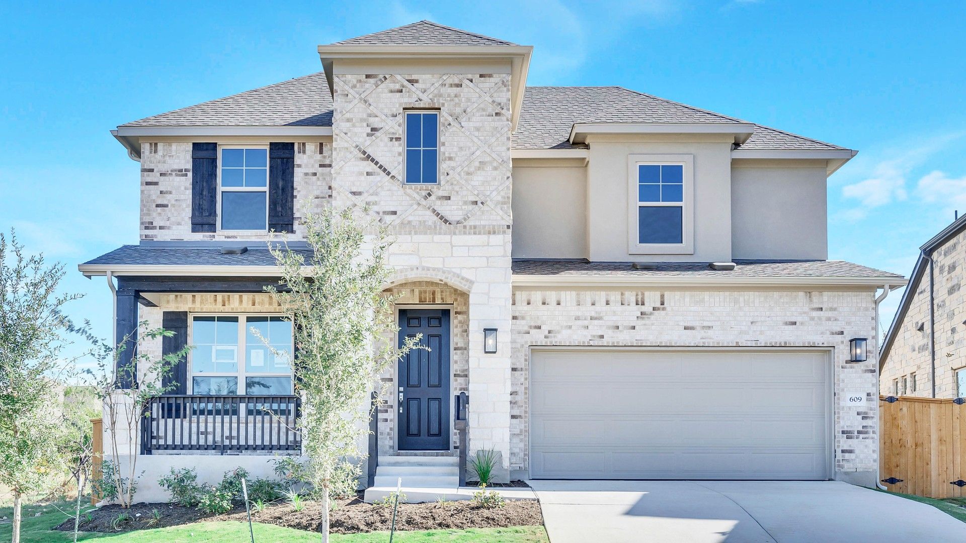 Two-Story Brick Home in Mirador Community:Luxurious brick facade and modern design in the exclusive Mirador community.