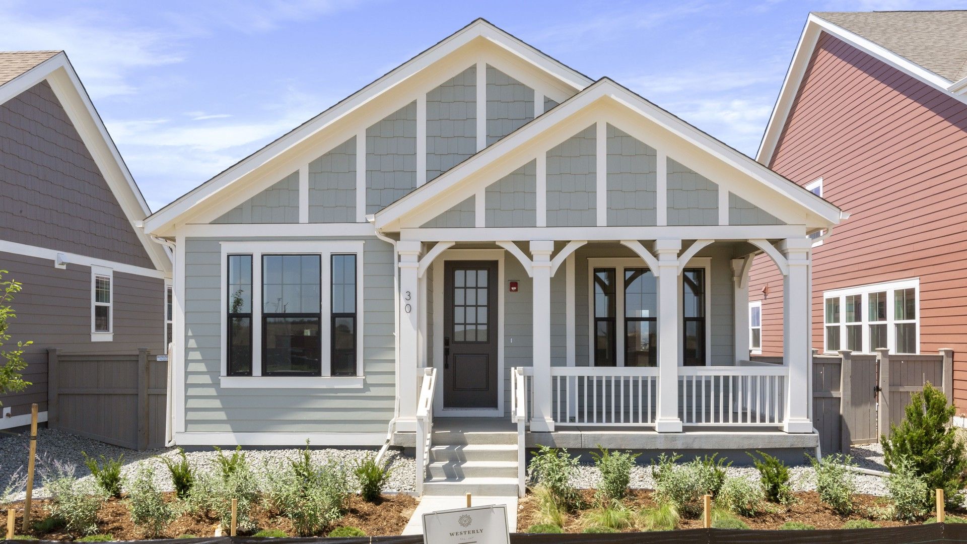 Craftsman Home with Porch and Red Door in Carbondale, Westerly:Elegant Craftsman home with refined white trim and vibrant red door. Located in the prestigious Carbondale, Westerly.
