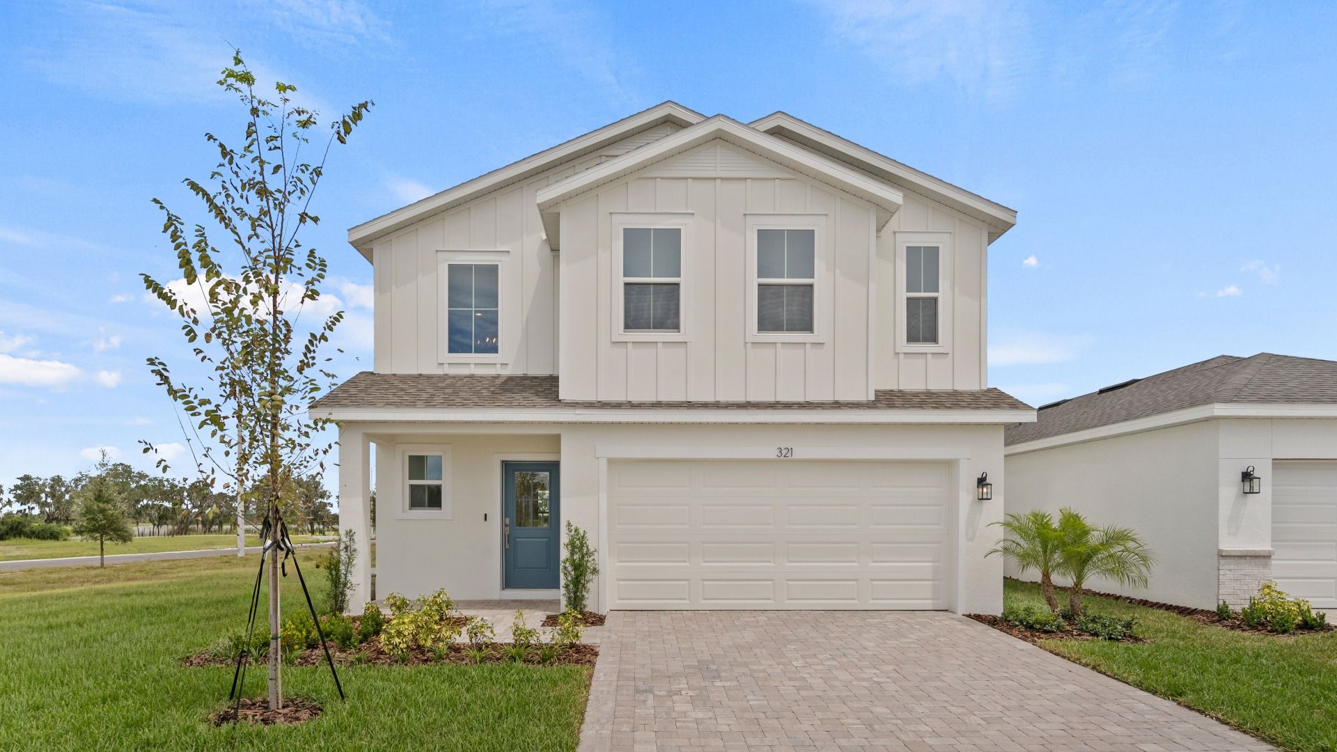 The Naples Front Exterior:The Naples Quick Move-In Home at Willowbrook North by DRB Homes in Winter Haven, FL