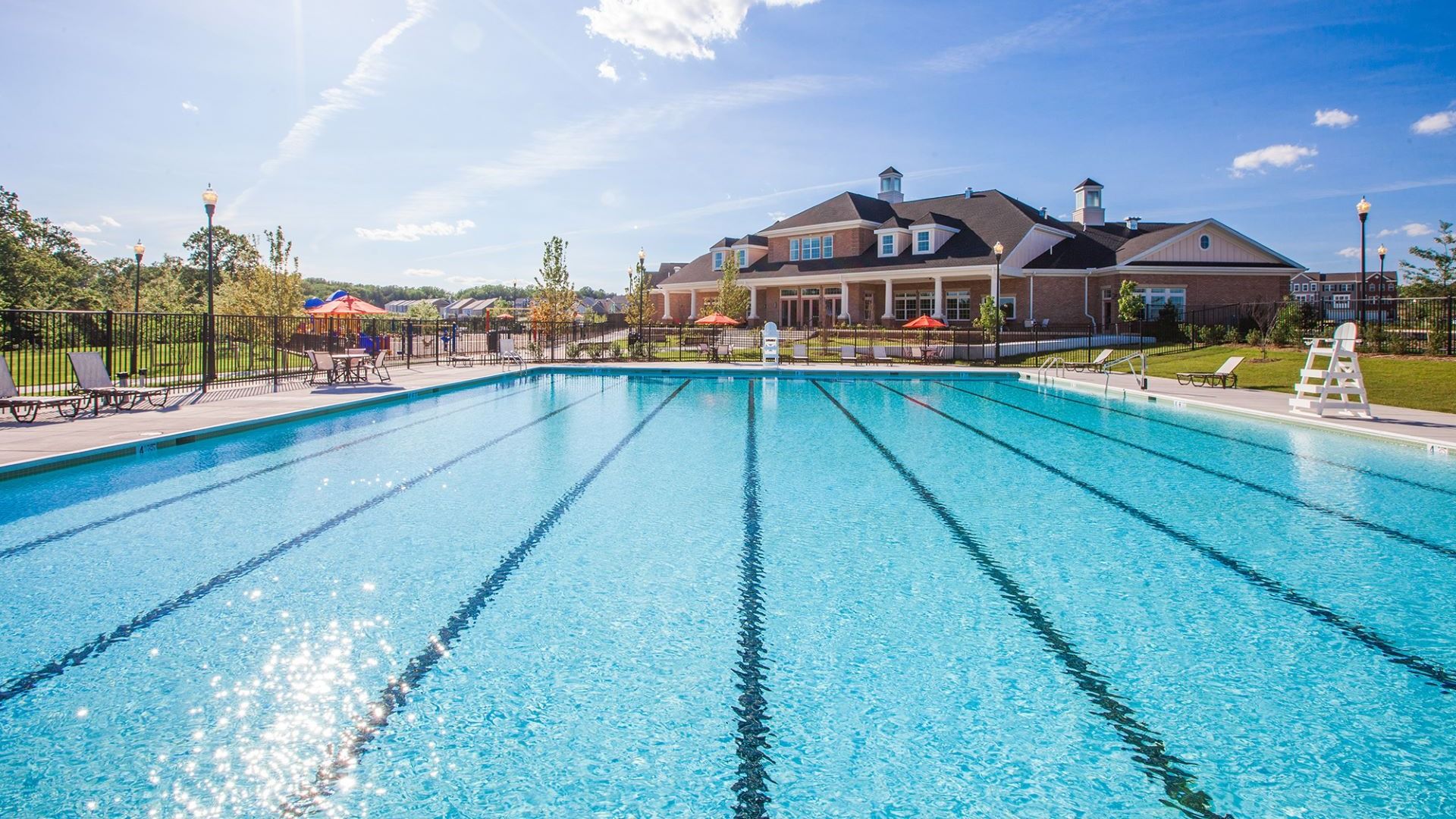 Clubhouse Pool:Stunning Pool with Loungers Located at the Clubhouse in the Parkside Community