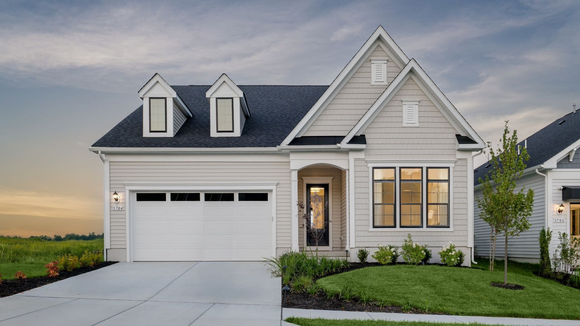 Adventurer Model Exterior at Victoria Park at Parkside:The Adventurer 55+ Lifestyle Home Plan at Victoria Park at Parkside in Upper Marlboro, MD