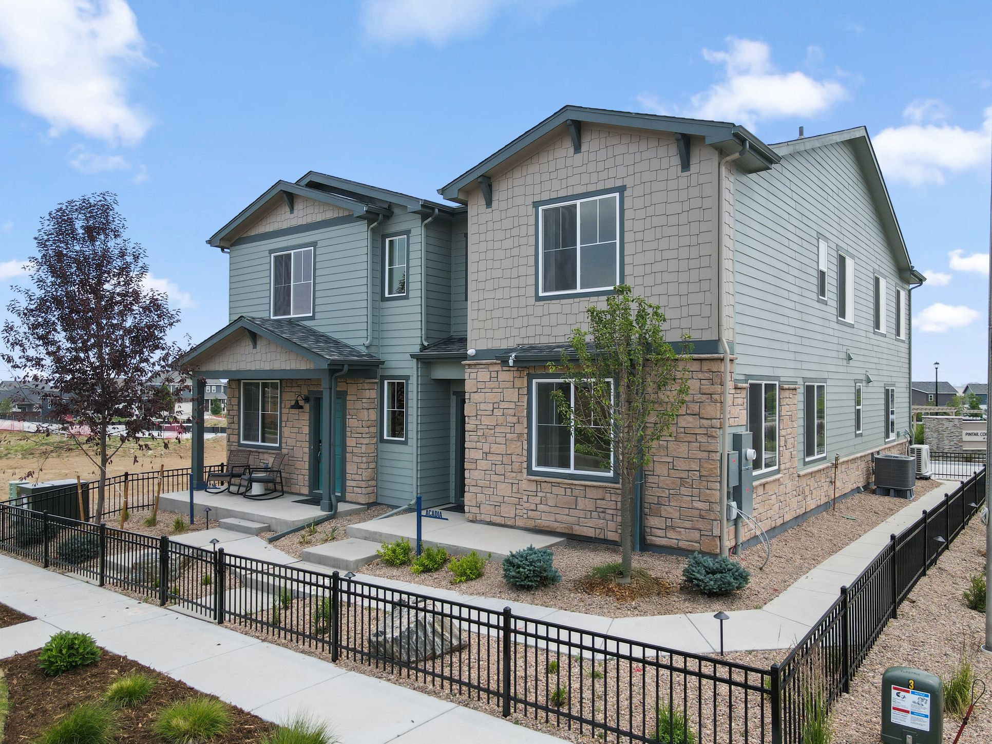 2. Pintail Commons - Acadia - Front Exterior 2 - Model Photography - Risewell Homes
