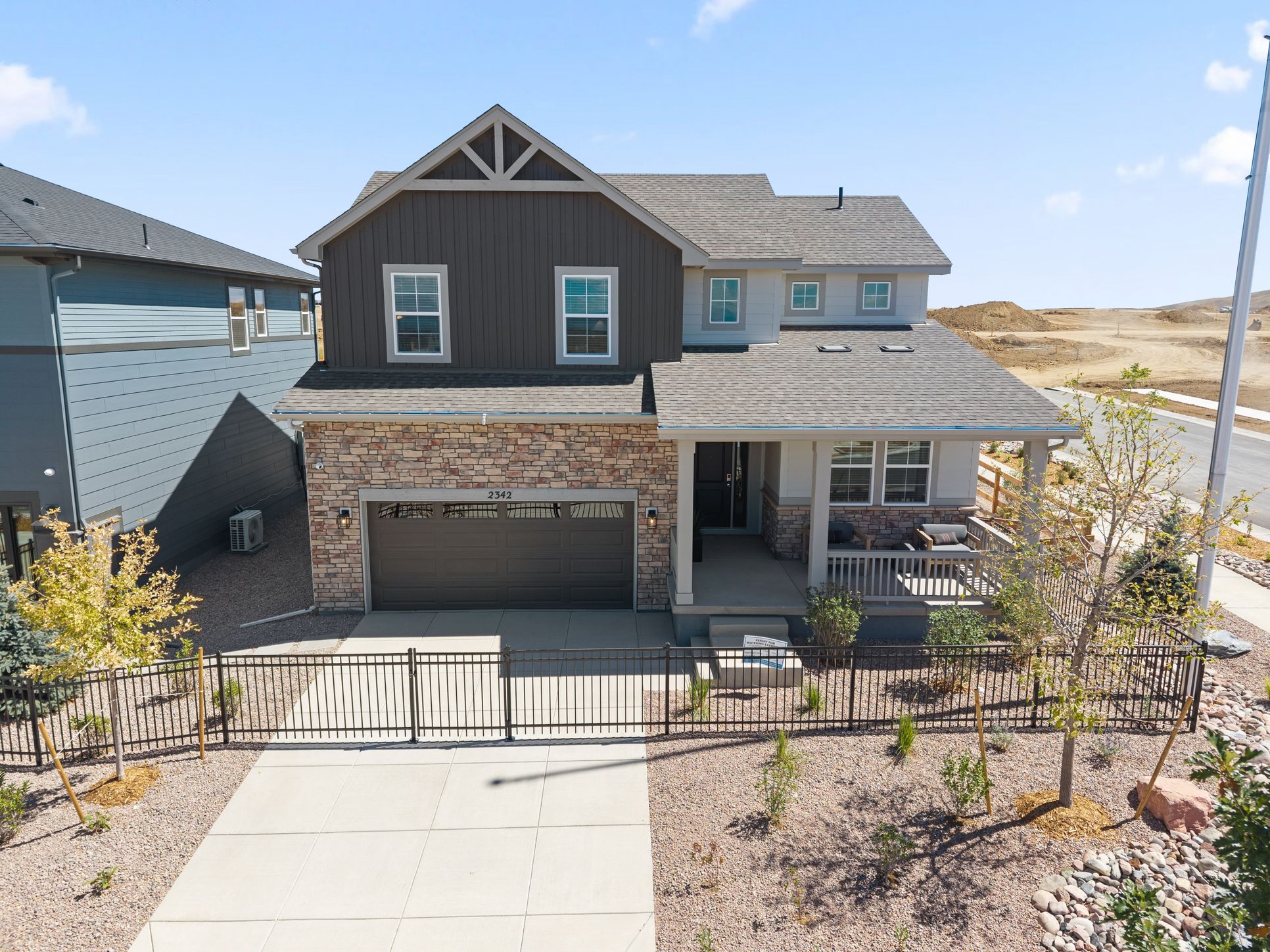 1 - Legacy at Harvest Crossing - Plan 4005 - Front Exterior - Model Photography - Risewell Homes