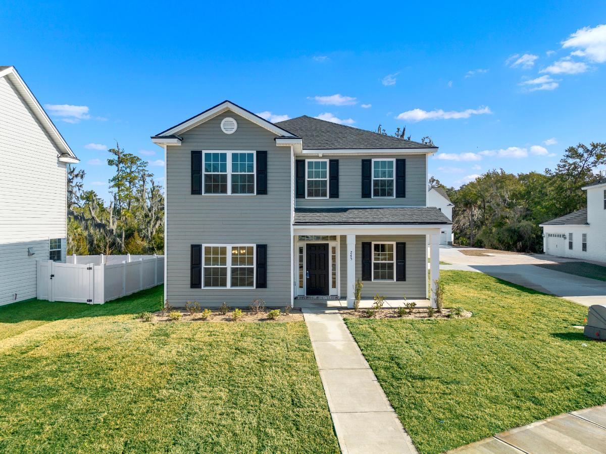 Oscar Mulberry floor plan exterior featuring a two-story new construction home with covered front...:Oscar Mulberry Exterior – Ernest Homes