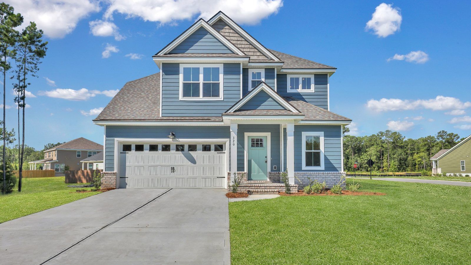 Exterior of the Sherwood floor plan, a two-story home with personalization options available in W...:Sherwood Floor Plan at Wexford in Richmond Hill GA