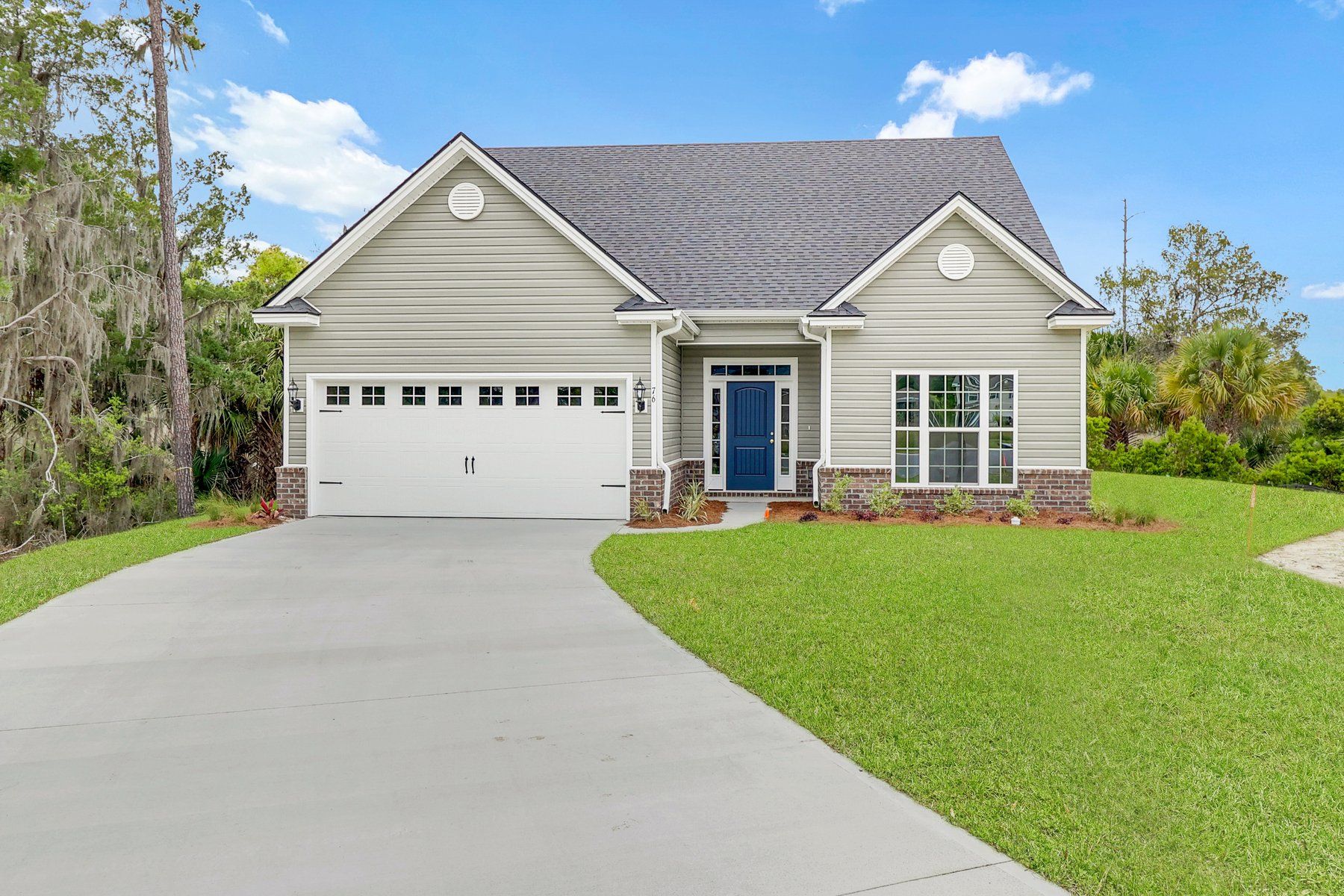 Straight-on exterior view of the Harbor 5-bedroom new home with two-car garage near Savannah GA.:Harbor – Exterior | Ernest Homes