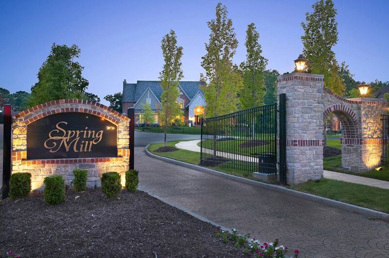 Gated entrance at Spring Mill new homes in St. Cha