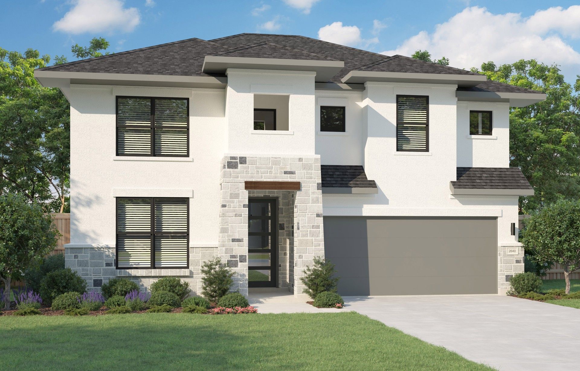 Modern Two-Story Home with Stone Accents in Magnolia Lakeside Meadows:Sleek stonework and expansive windows enhance this modern Magnolia home at Lakeside Meadows.