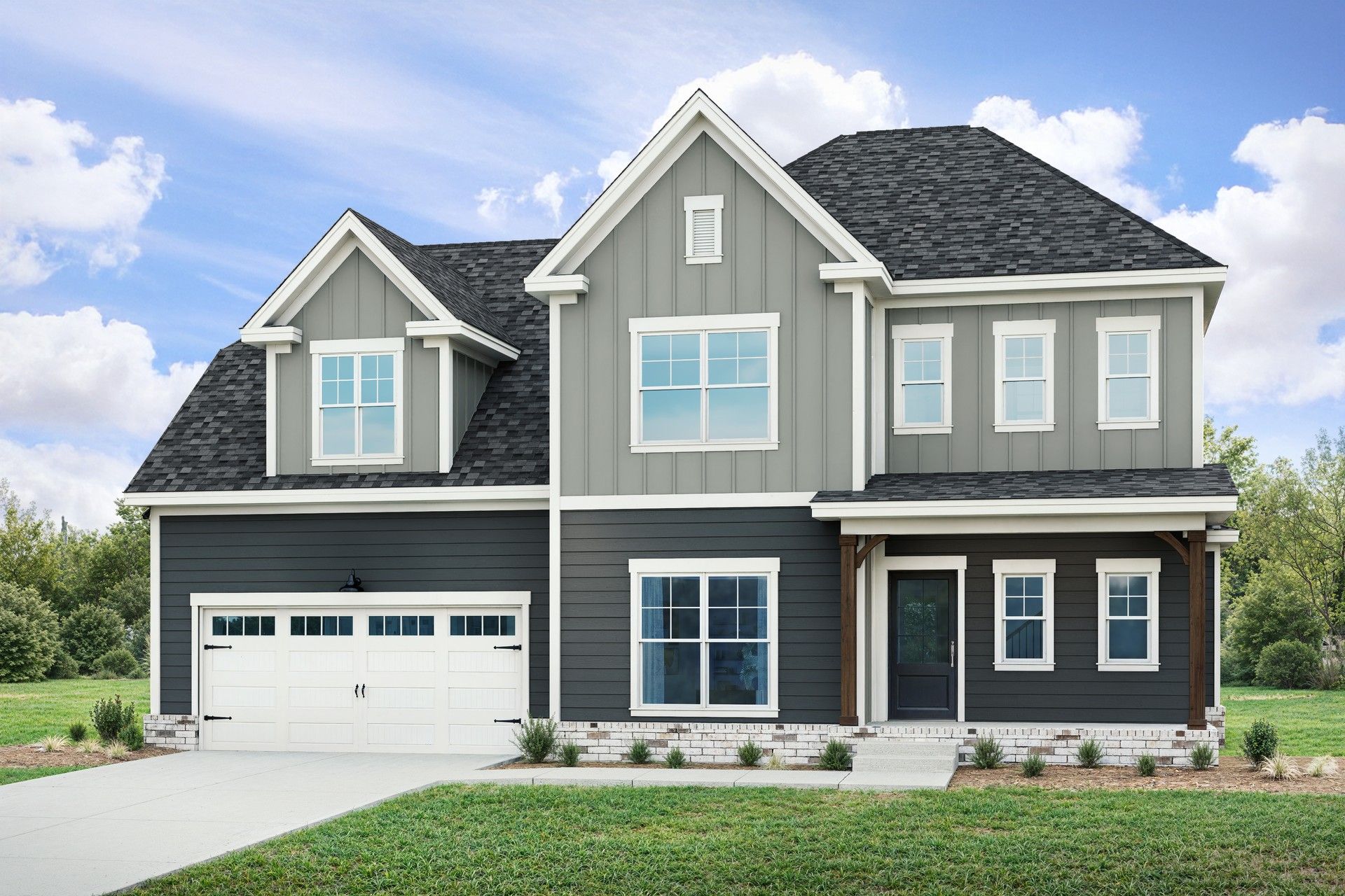 Modern Two-Story Home in Richvale Estates with Gabled Roof:Experience luxury with gabled rooflines and sleek grey siding at Richvale Estates.