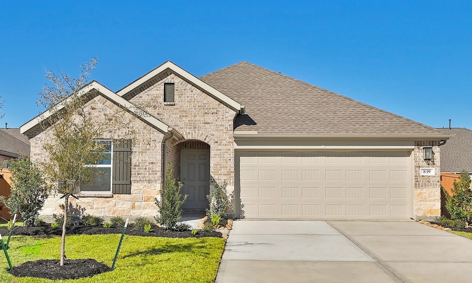 Brick Home with Gable Roof in River Ranch, Bermuda:Exquisite brick façade and elegant gable roof define this River Ranch residence.