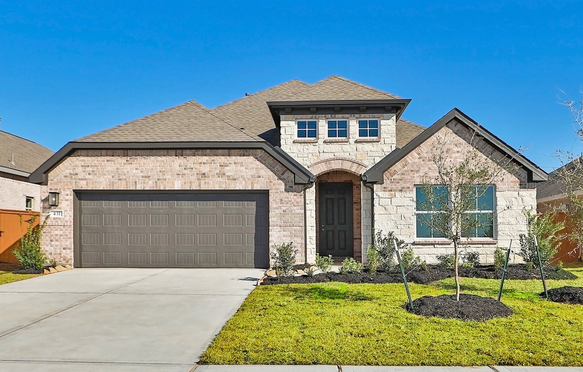 Stunning Brick Home with Gable Roof in River Ranch:Experience luxurious living in this elegant brick facade residence boasting a refined gable roof in River Ranch.