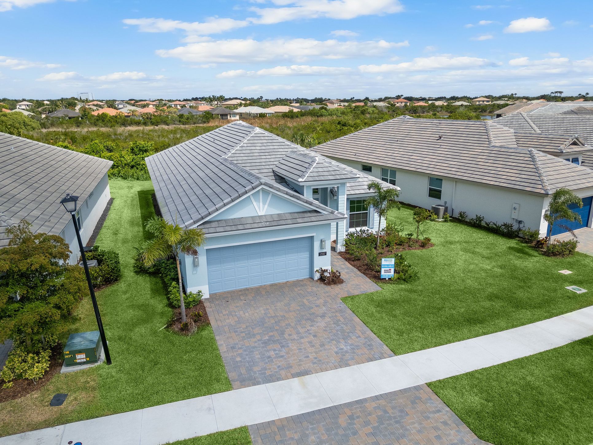 Aerial Front Elevation | 12507 SW Sunrise Lake Terrace:Aerial Front Elevation | 12507 SW Sunrise Lake Terrace