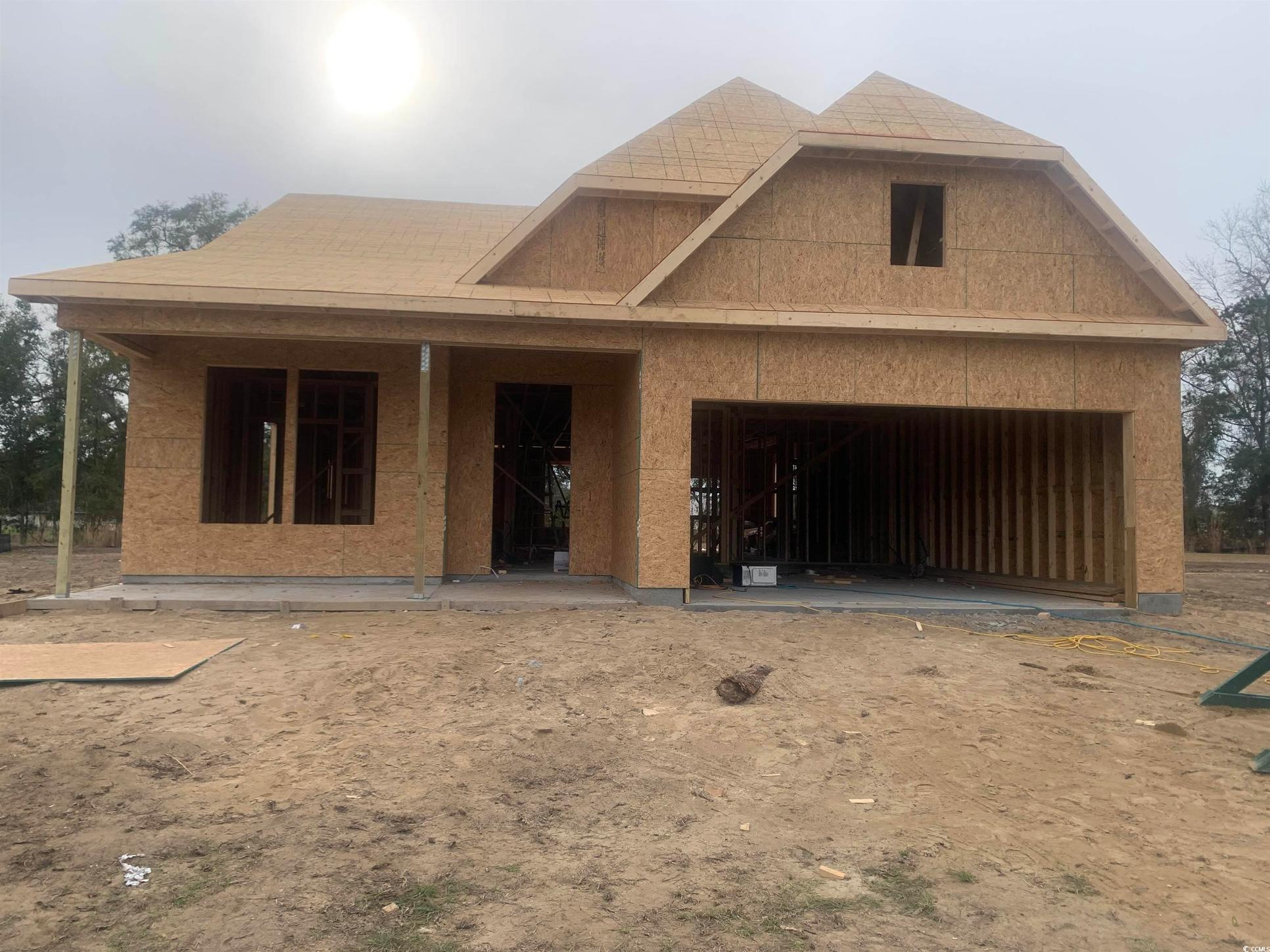 Exterior:View of front facade with a garage