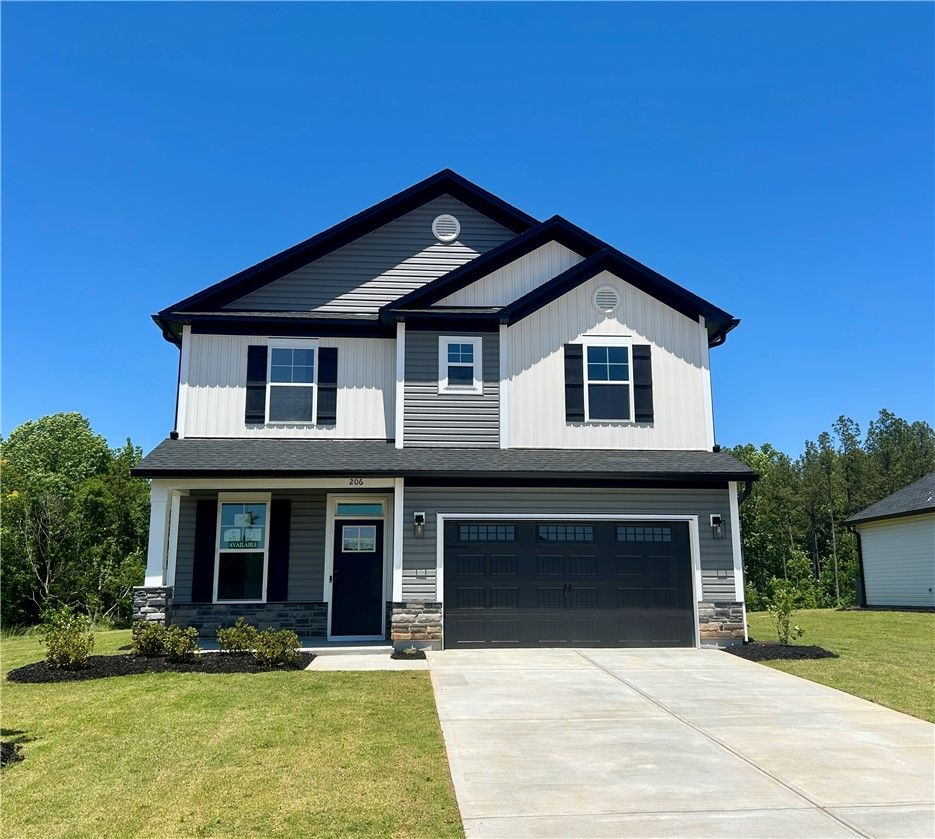Exterior:This newly constructed home boasts charming curb a