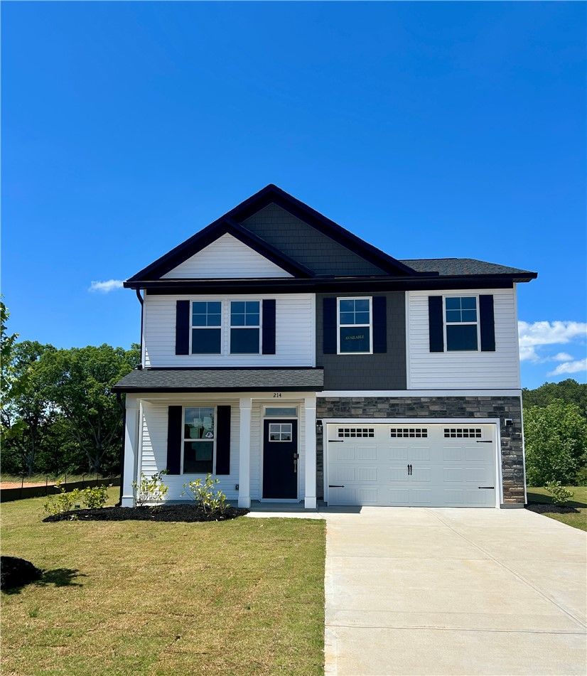 Exterior:This charming residence features a well-maintained