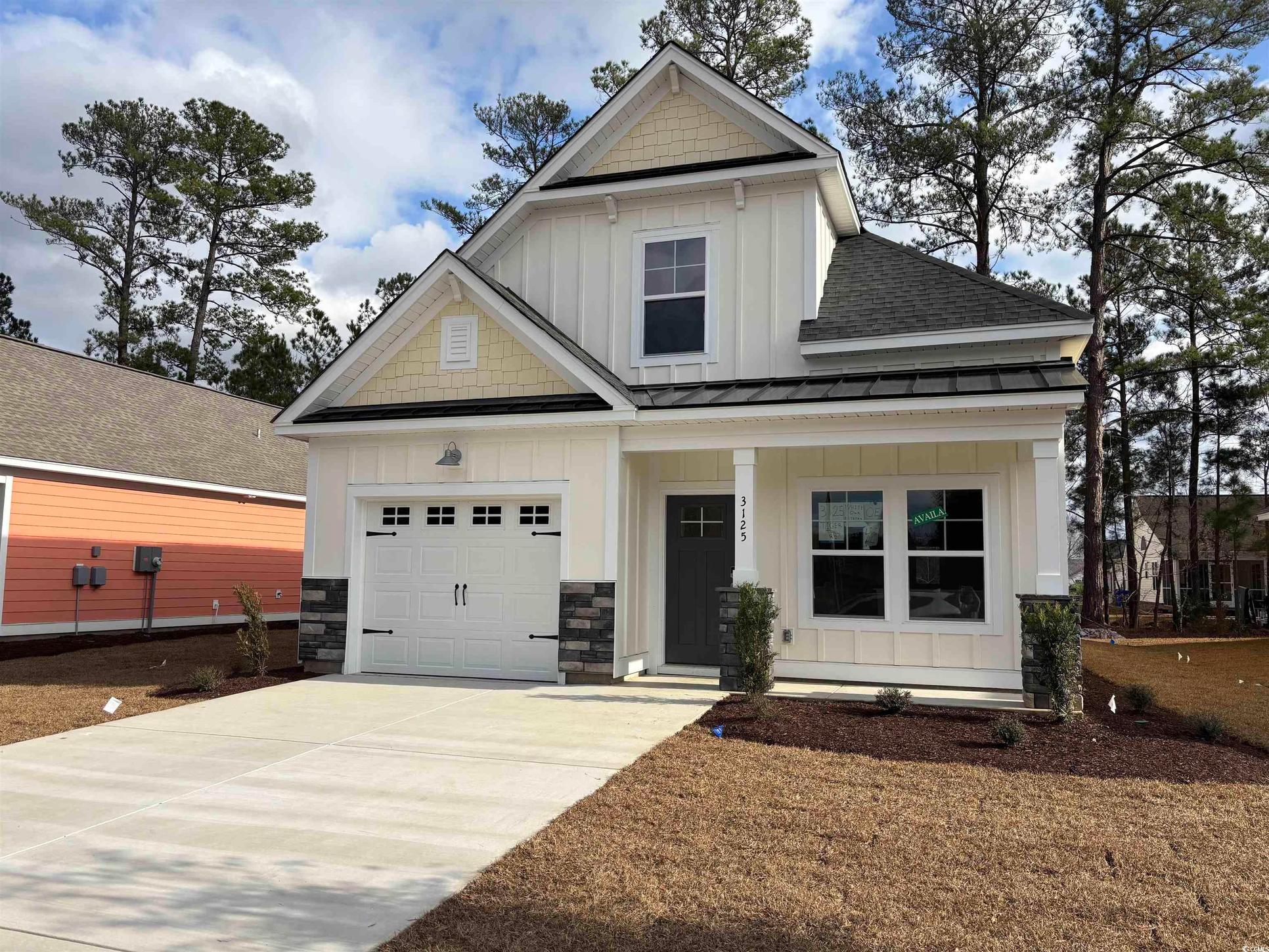 Exterior:Craftsman house with a garage