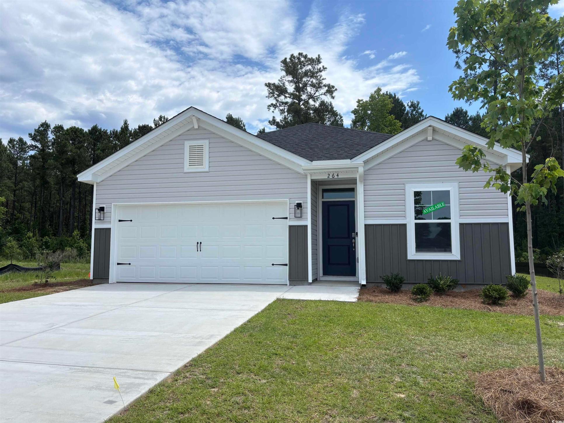 Exterior:Single story home with driveway, a front lawn, an attached garage, and a shingled roof