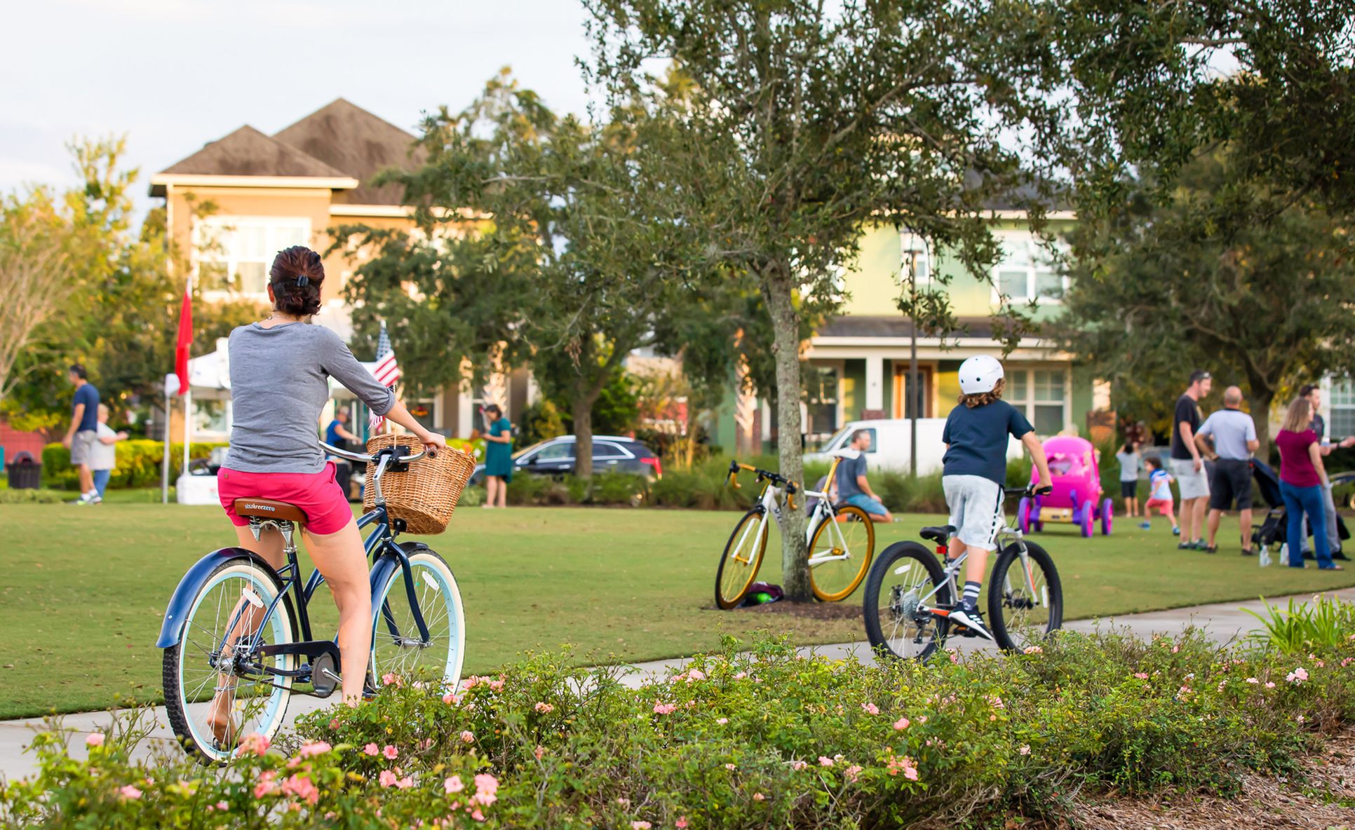 Residents Biking Through Laureate Park
