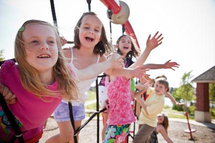 Family at a Carrington Place park, a community of 