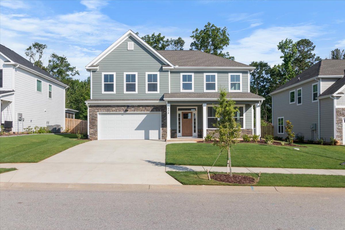 Front exterior of 838 Lillian Park Drive, a move-in ready home in Crawford Creek by Ivey Homes, f...:Front Exterior | 838 Lillian Park Drive in Crawford Creek by Ivey Homes