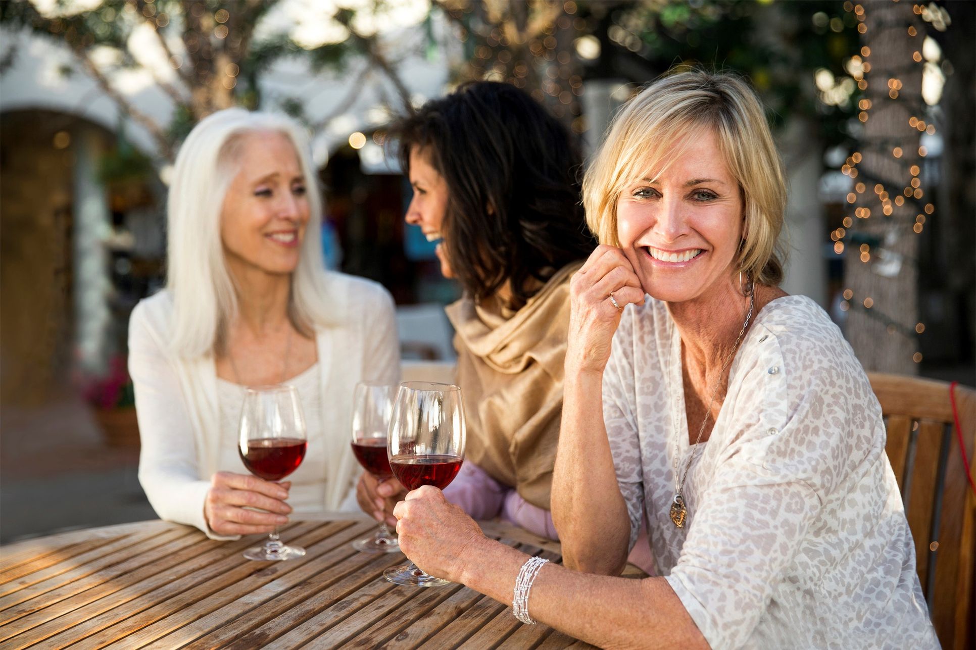 Older ladies enjoying wine