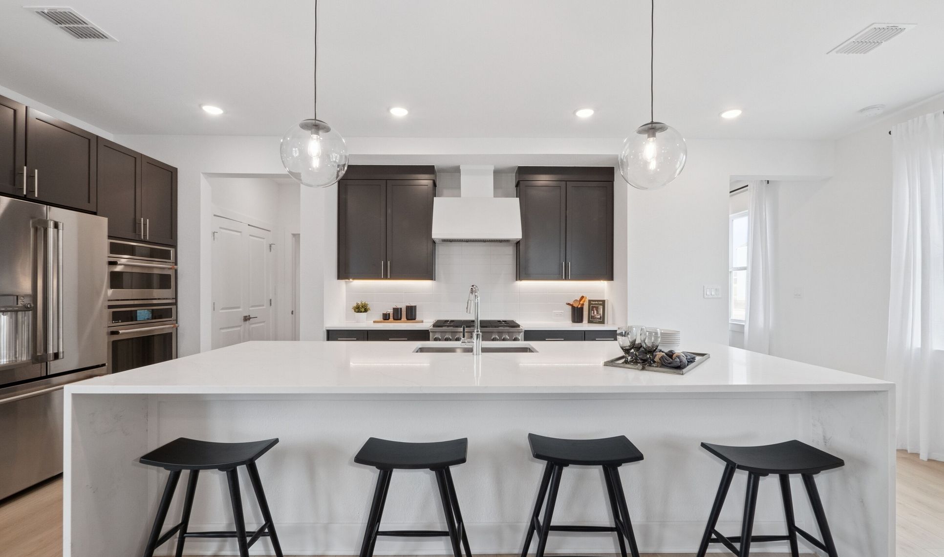 Interior:Kitchen with waterfall-edge central island