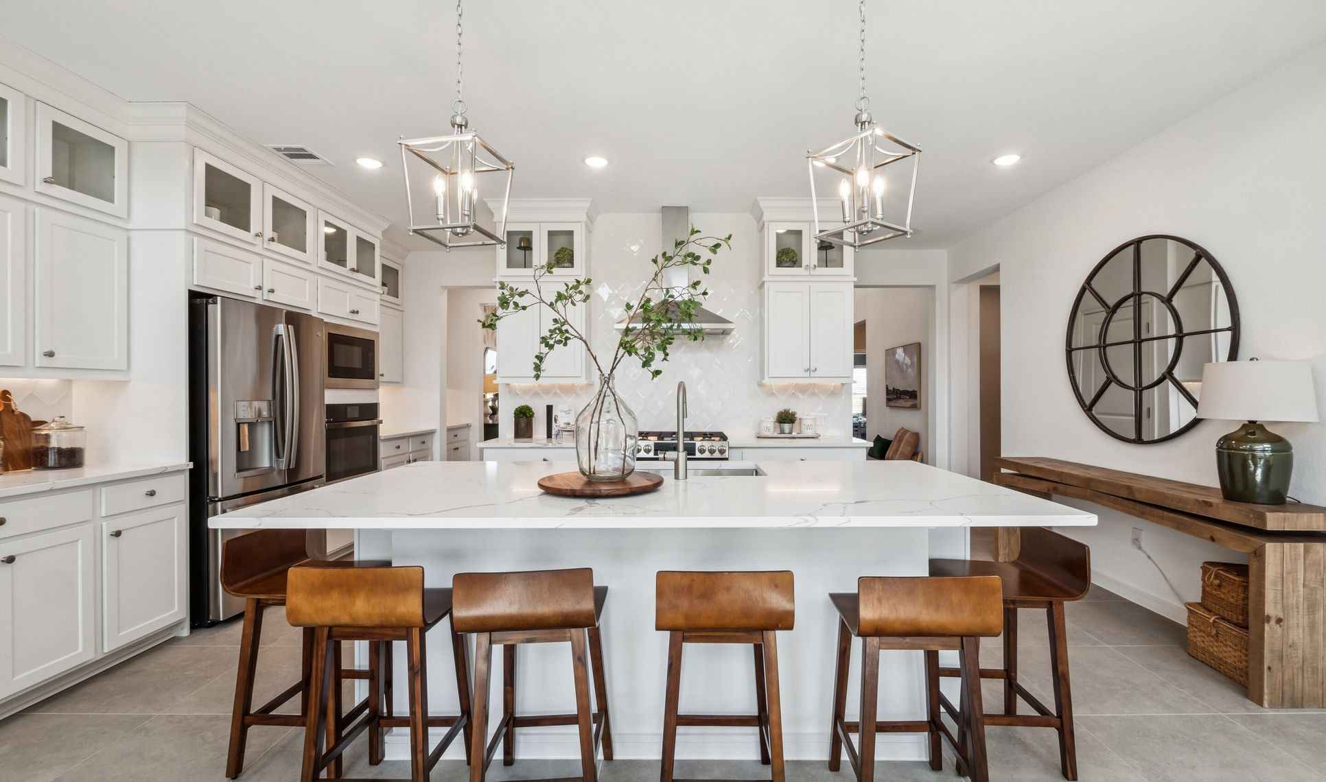 Interior:Kitchen with stacked glass-front upper cabinets over solid lowers