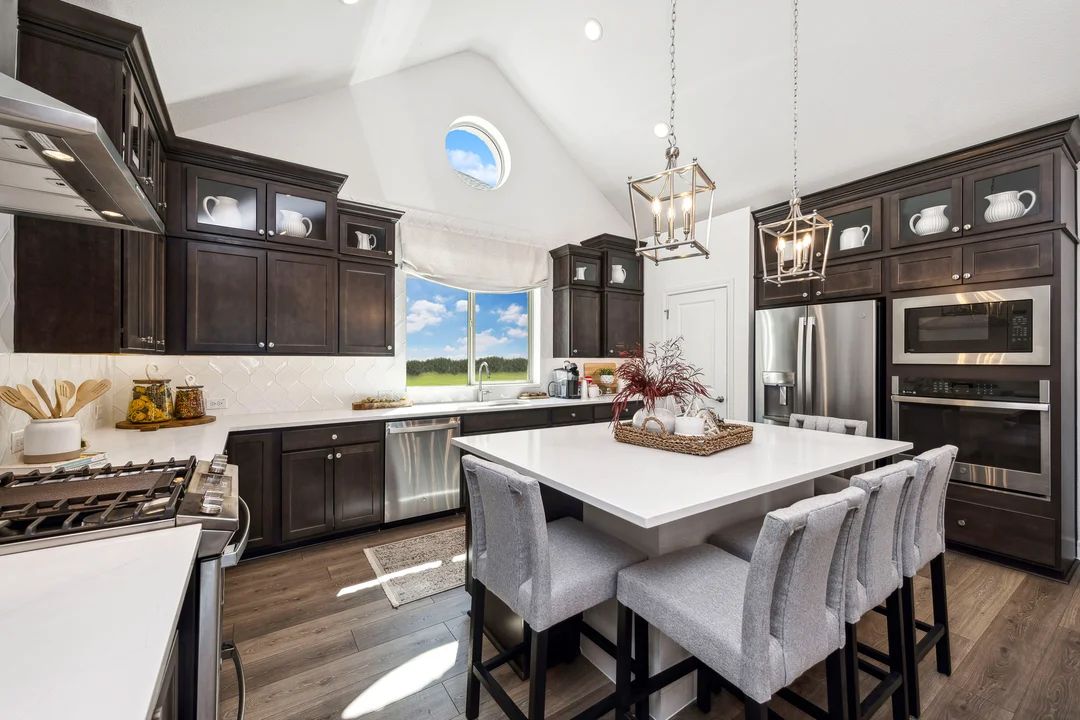 Interior:Vaulted ceiling with pendant lighting in kitchen