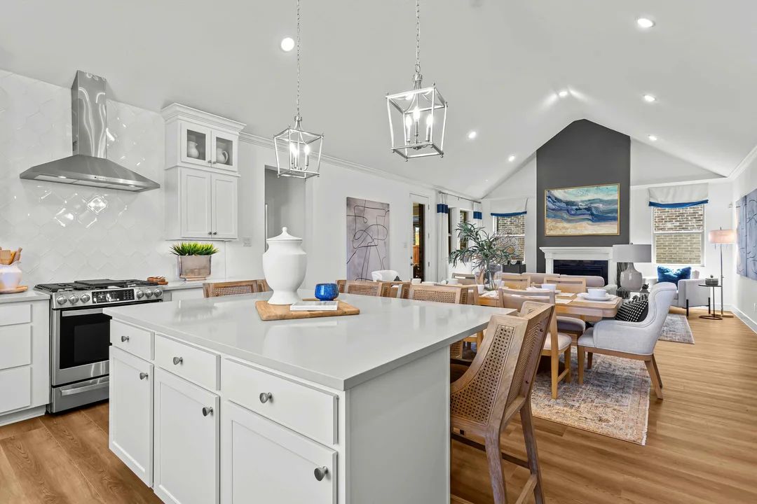 Interior:Kitchen with large island adjacent to dining area and great room