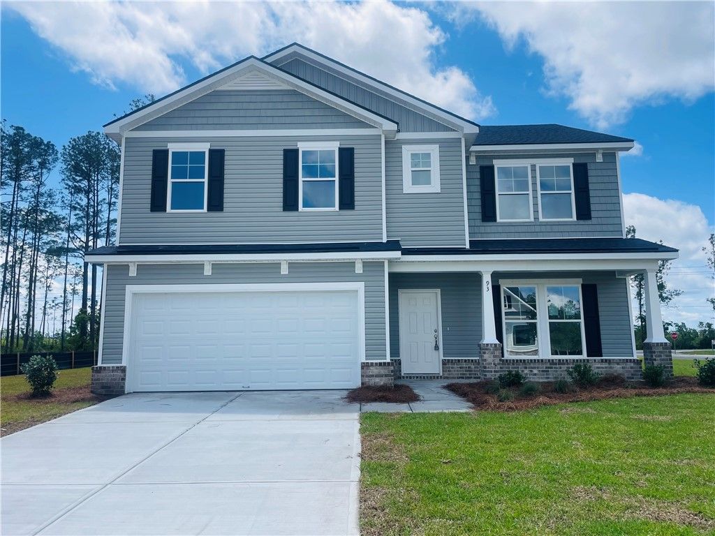 Exterior:Front of the home. The home is on a large corner lot.